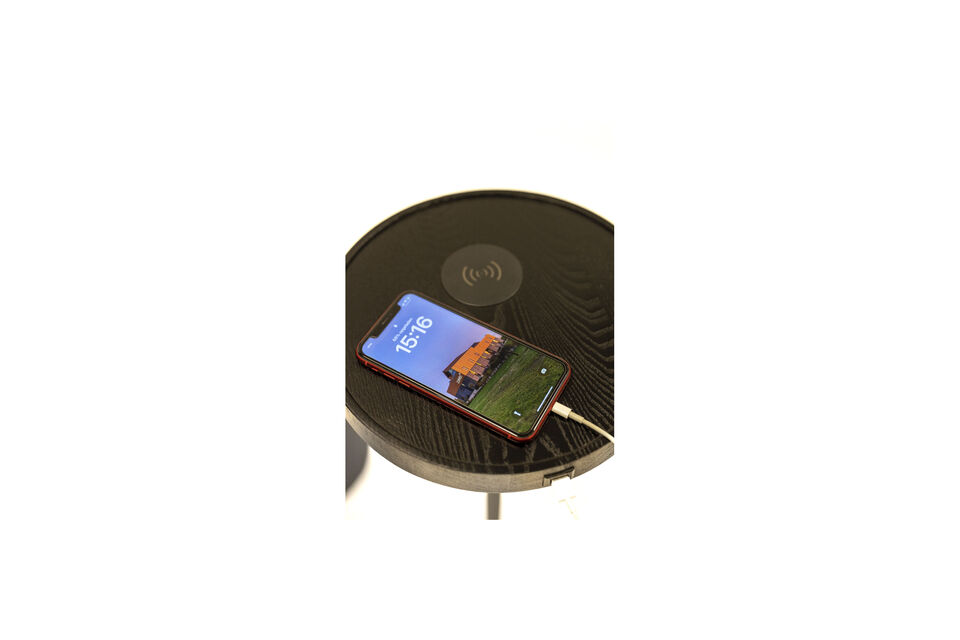 Charge your smartphone wirelessly using the charging station built into the side table