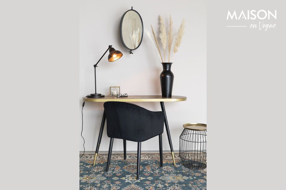 With its sturdy oval metal frame and luminous gold finish