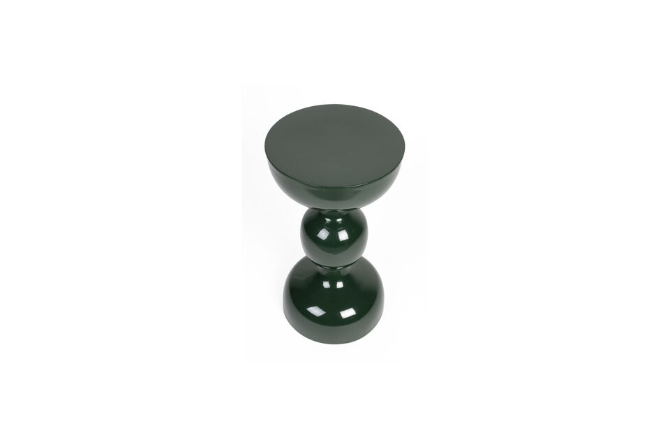 The side table is crafted from sleek metal