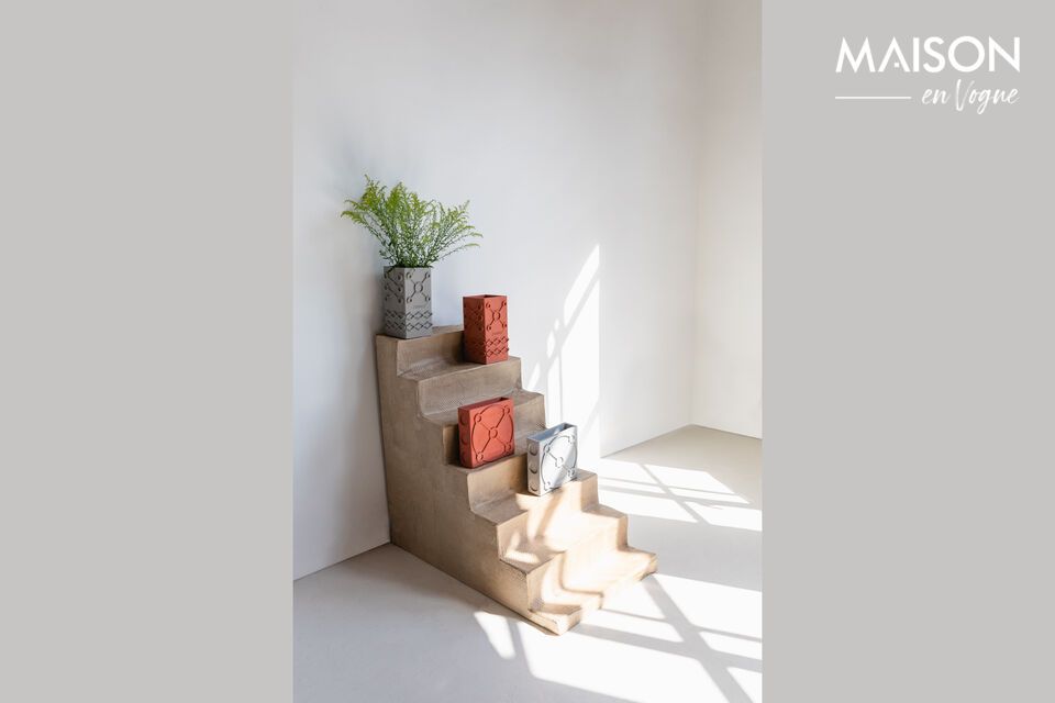 Enhance your interior with a graphic concrete vase.