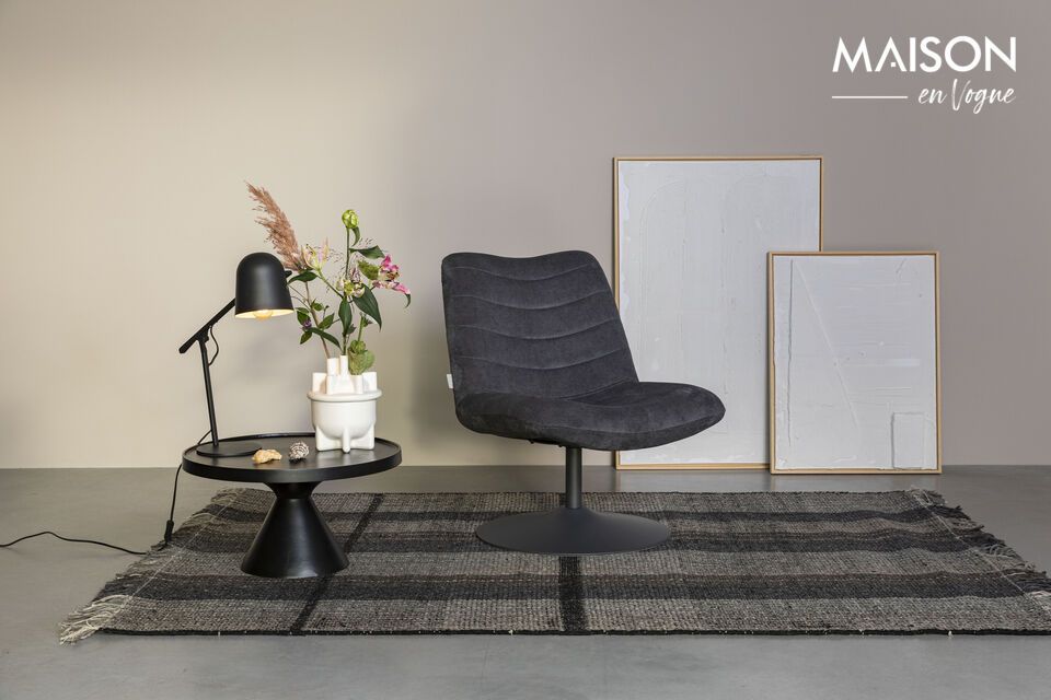 Upholstered in grey corduroy fabric with a discreet zigzag pattern