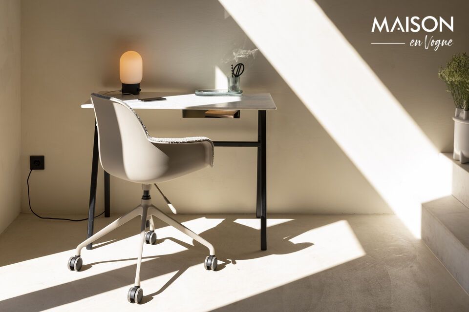 The chair features a padded seat, offering extra comfort for extended periods of sitting