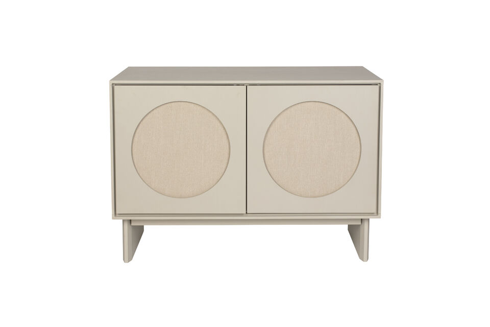 The door of this piece is embellished with a soft fabric circle