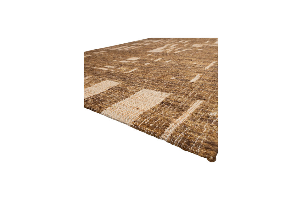 The hand-woven rug is made from a blend of 50% wool and 50% cotton
