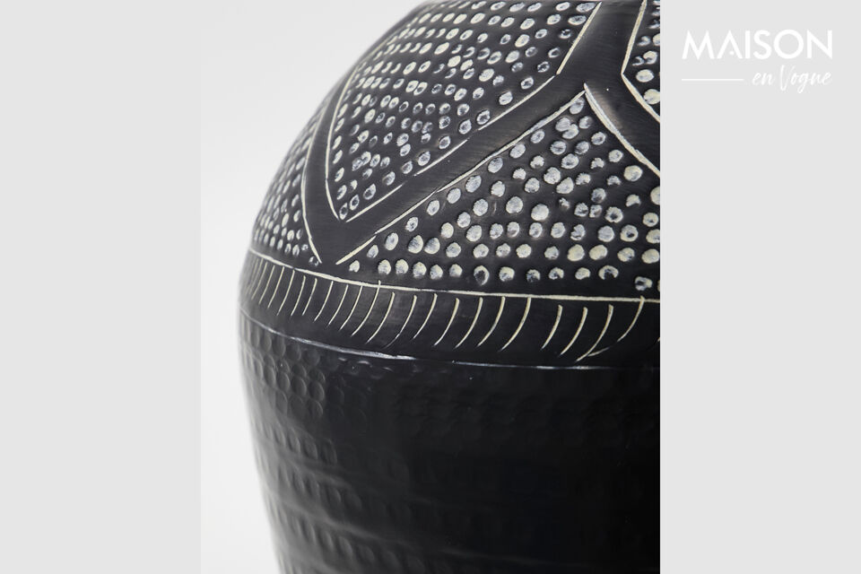 Introduce a touch of artistry to your living space with this handmade vase featuring an exquisite