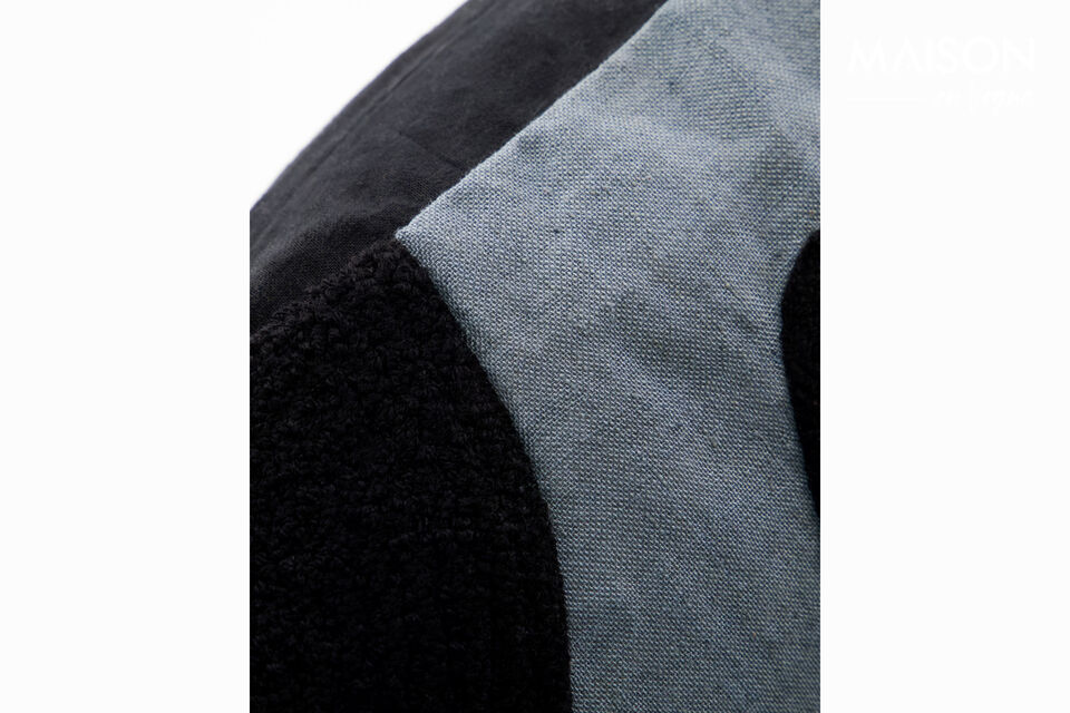 The HDMiki cushion is handmade from a cotton and linen blend with an eye-catching soft