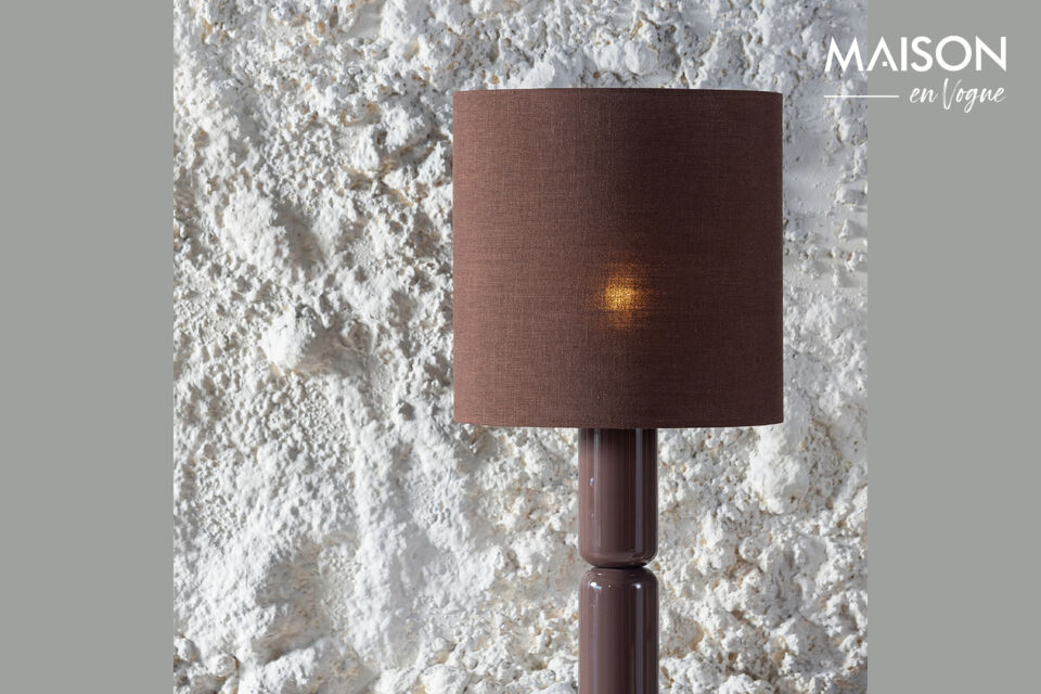 Design &eacute;l&eacute;gant avec un pied unique Finition brillante luxueuse Couleur brun