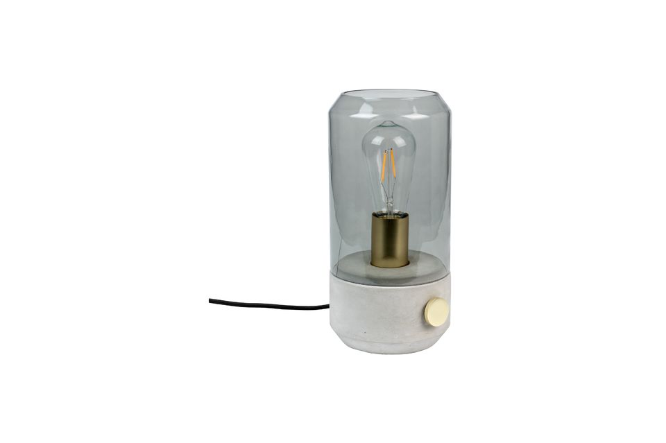 La lampe est enfermée dans une cloche en verre fumé non trempé