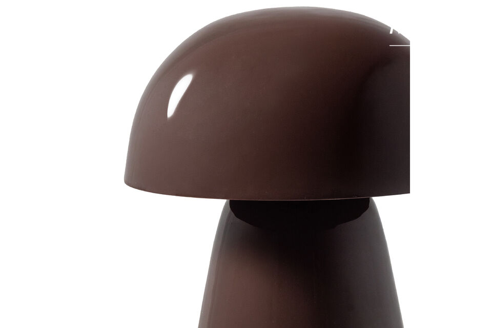 La silhouette organique en forme de champignon donne &agrave; la lampe un aspect unique qui se