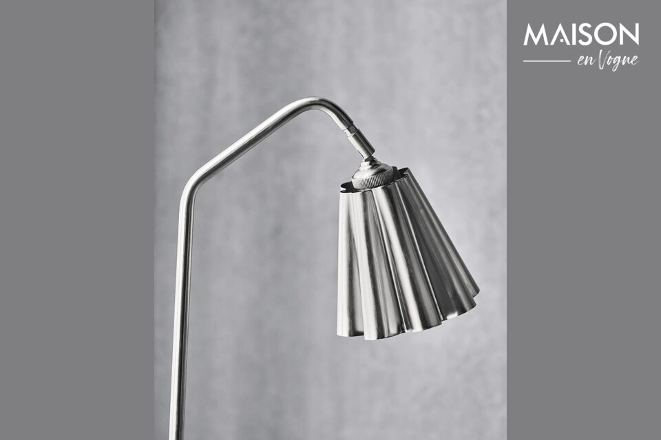 The unique Flola lampshade is handmade from iron with a brushed silver finish