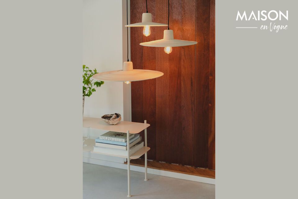 Its almost flat appearance seems to defy gravity, adding an airy character to any space