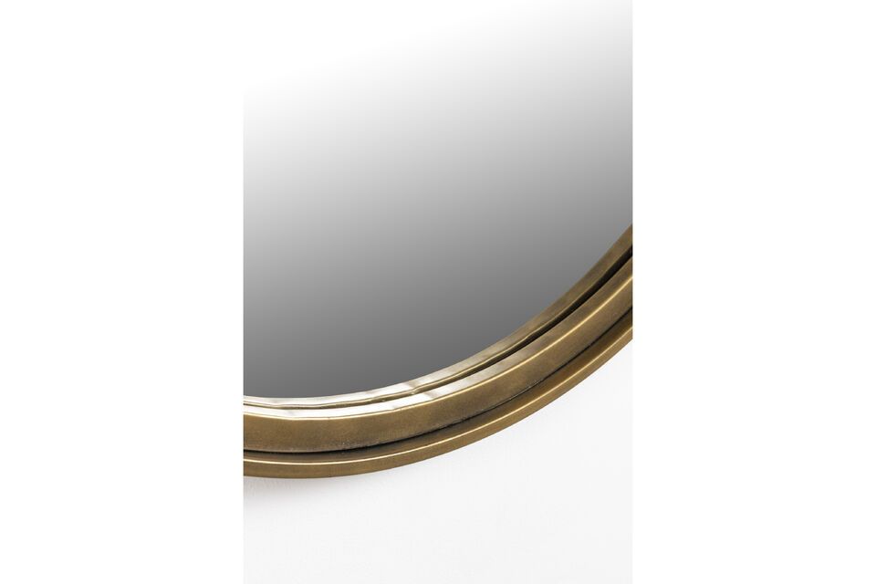 This bronze-colored iron mirror will blend harmoniously into interiors with warm or neutral tones