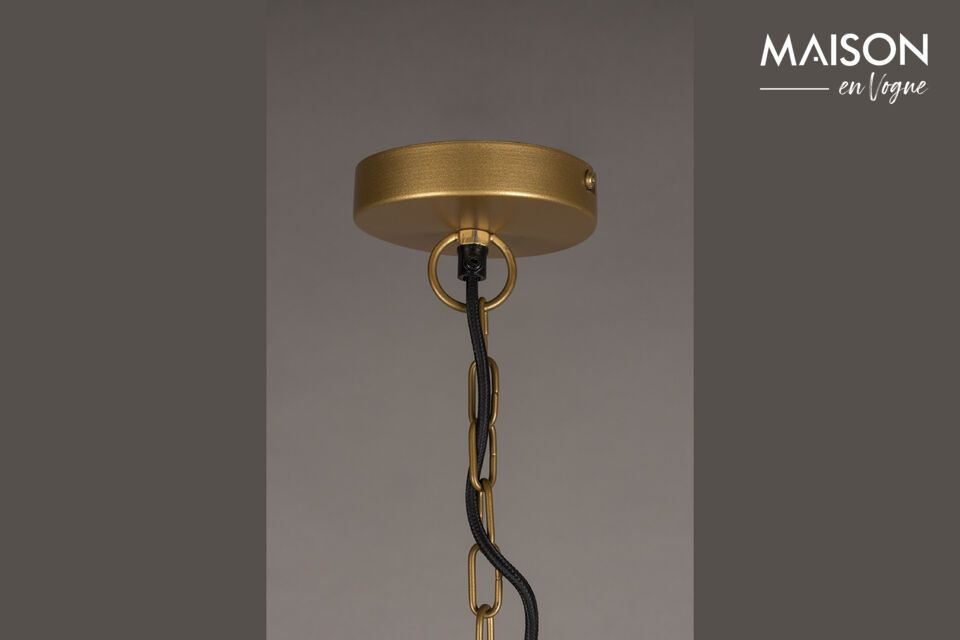 The suspension lamp\'s design is both modern and classic