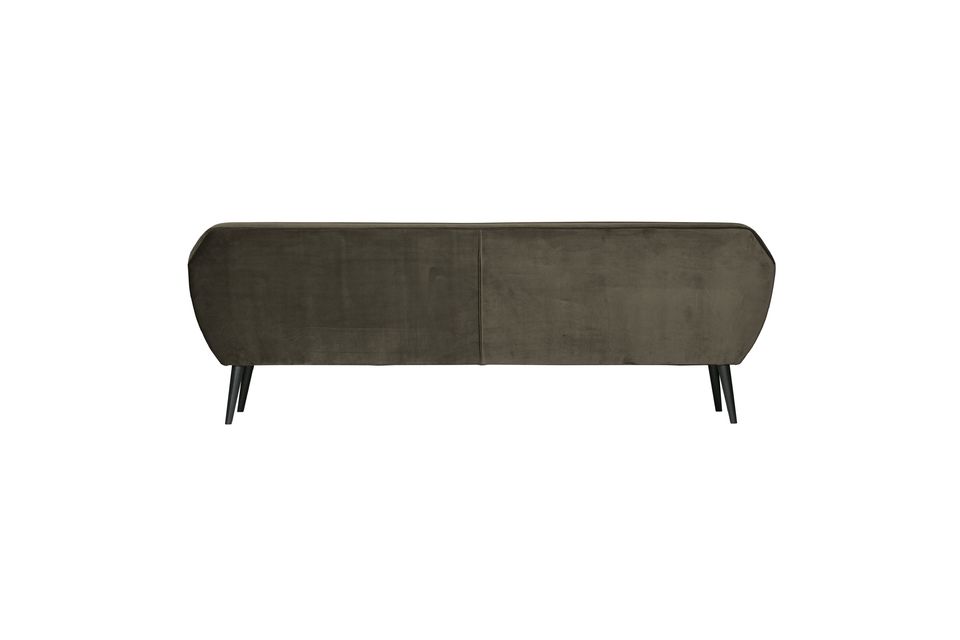 This modern sofa is designed for four people and is upholstered in 100% polyester velvet