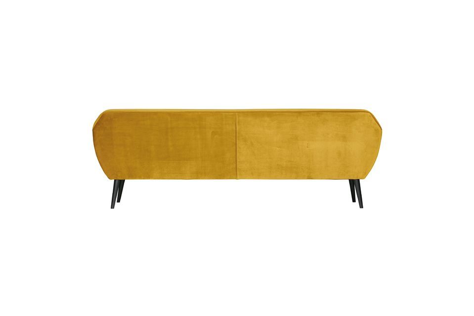 The sofa has black wooden legs and a soft foam seat that makes it especially comfortable