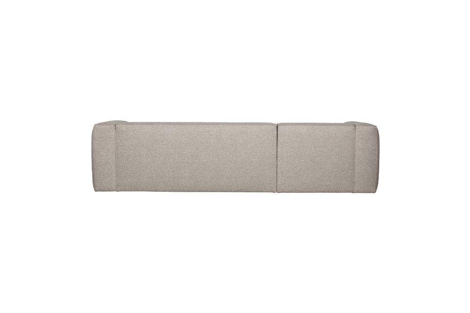 The additional matching decorative cushions complete the armchair
