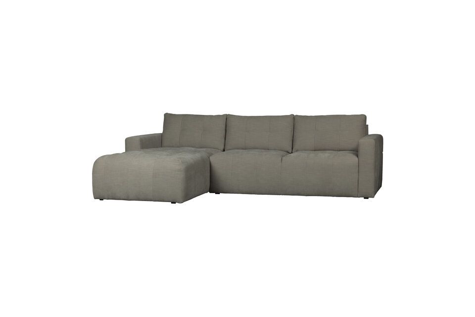 Covered in a soft, faded fabric, this sofa will be the centerpiece of your seating area