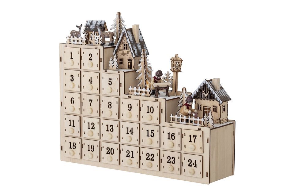 The Richie Calendar by Bloomingville is a beautiful Winter Wonderland castle with doors numbered