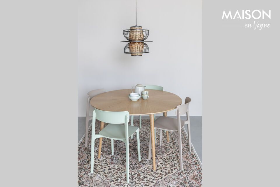 Esta mesa de comedor redonda no es sólo un mueble