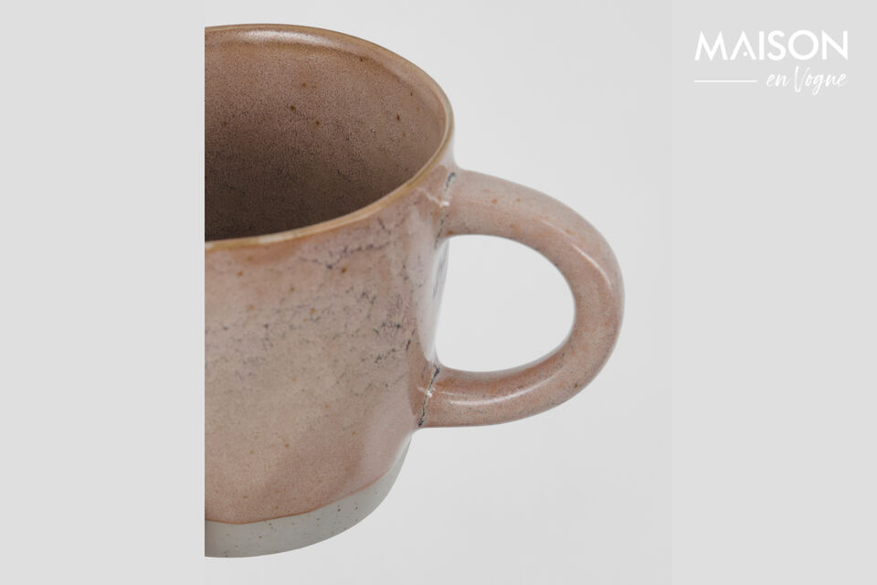 Enjoy your favourite hot drink with this set of four handmade stoneware mugs in a soft rose shade