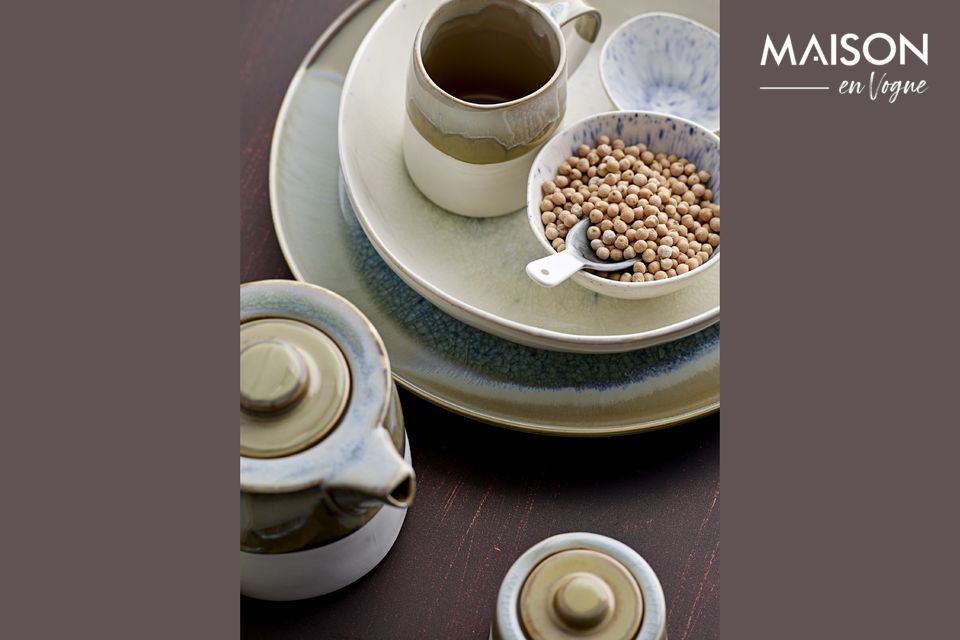 It is made of stoneware and is covered with a brown glaze up to halfway up