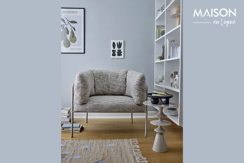 The chair features powder-coated iron legs in a light tone