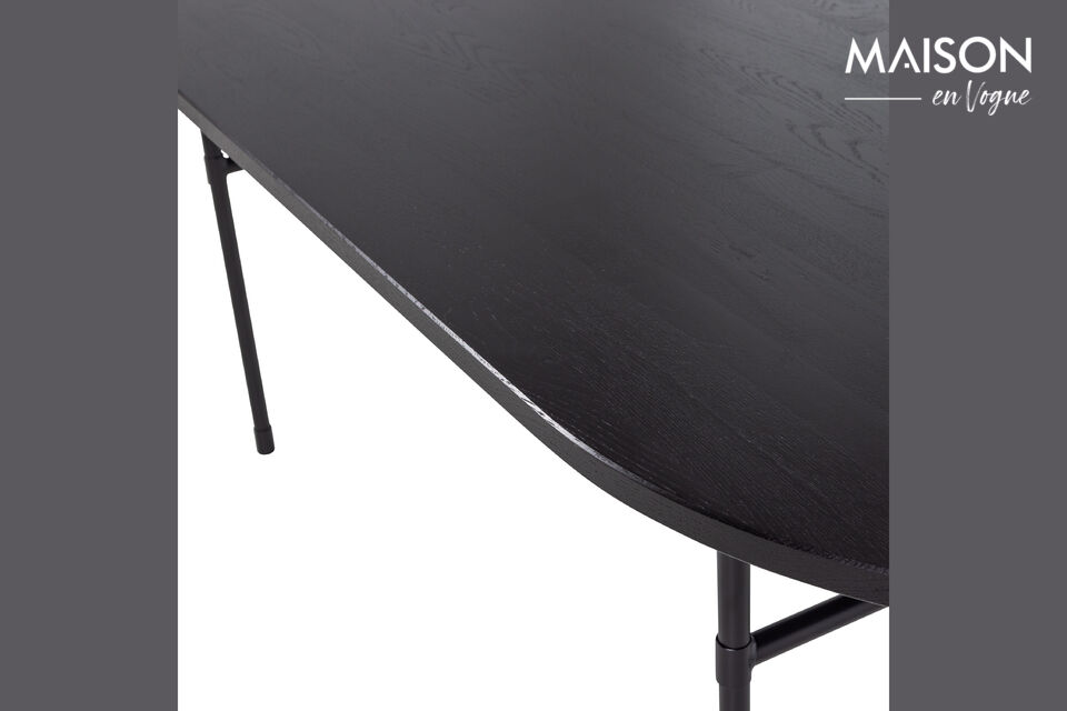 The table has a generous tabletop with rounded corners