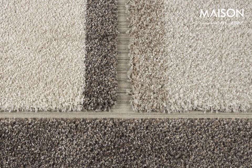 A gray wool rug that reinvents your spaces.