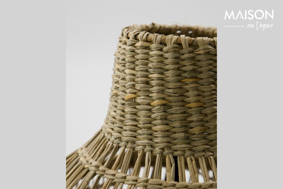 Introduce warmth and elegance to your home with this handwoven seagrass lamp