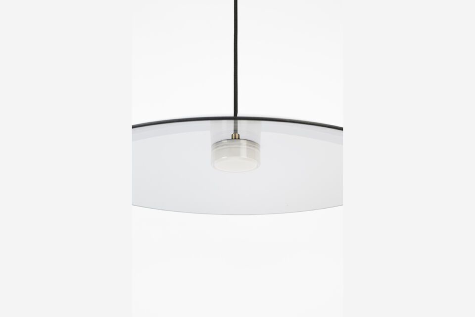By integrating the Float clear glass pendant into your furnishings