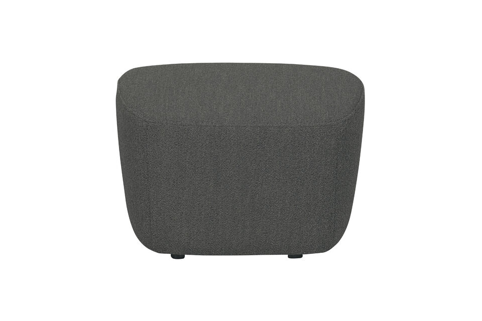 Ses formes rondes associées à la texture laineuse du tissu bouclé instaurent une atmosphère