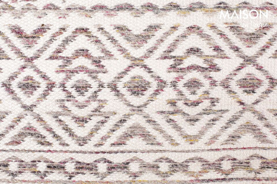 Refine your decor with the multicolored handmade wool rug.
