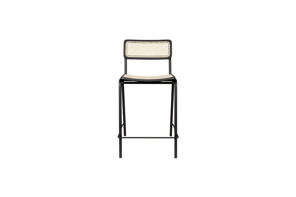Elegance and modernity meet in the design of the Jort Rattan and Black Metal Counter Chair
