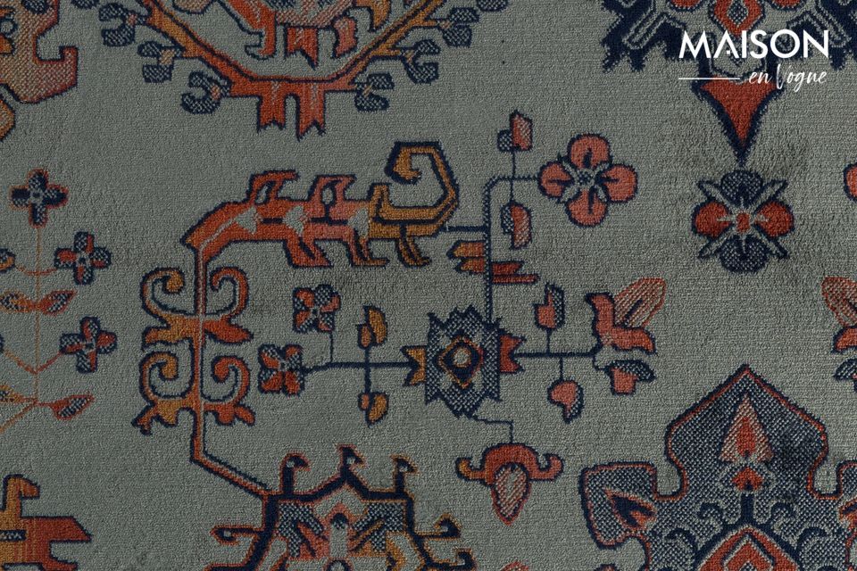The carpet is decorated with fringes across its width