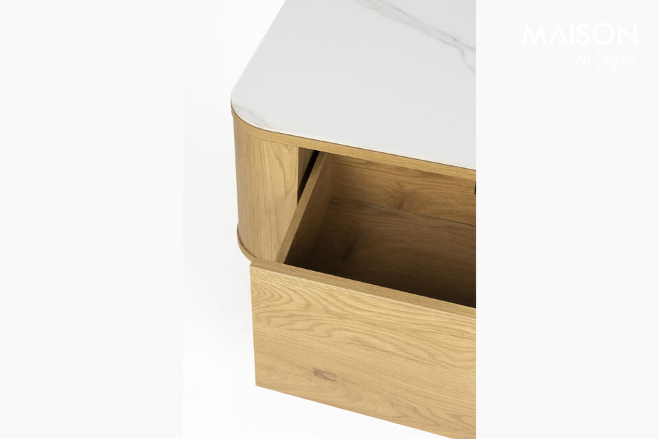The rounded design and subtle detailing give the furniture a soft, luxurious look