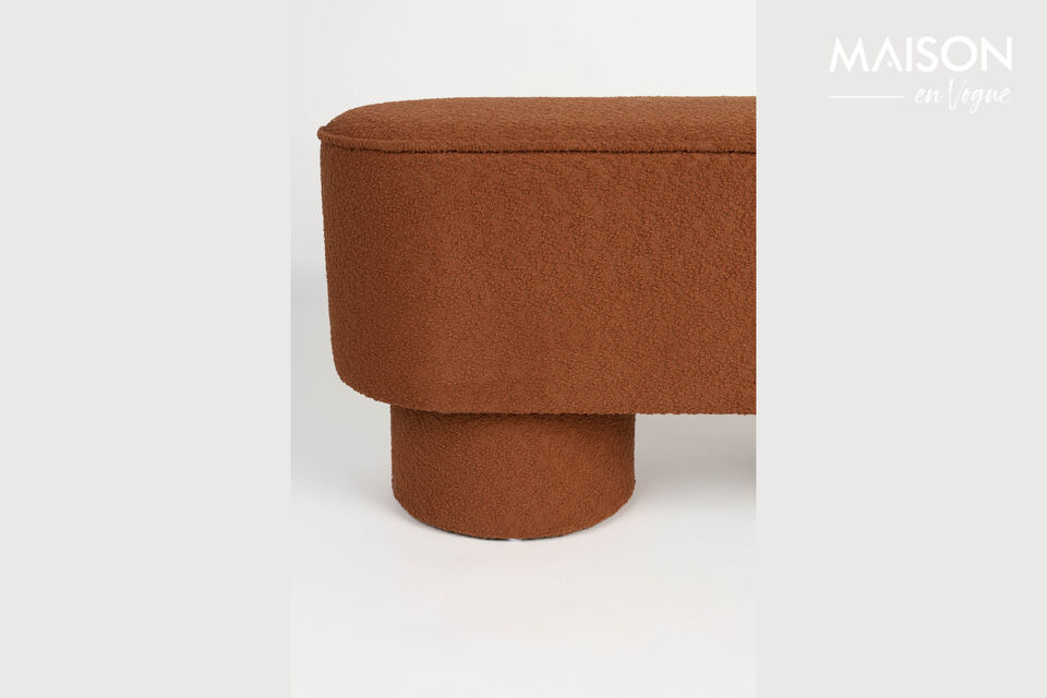 Its bouclé upholstery, available different stunning colours, adds a touch of elegance to any room