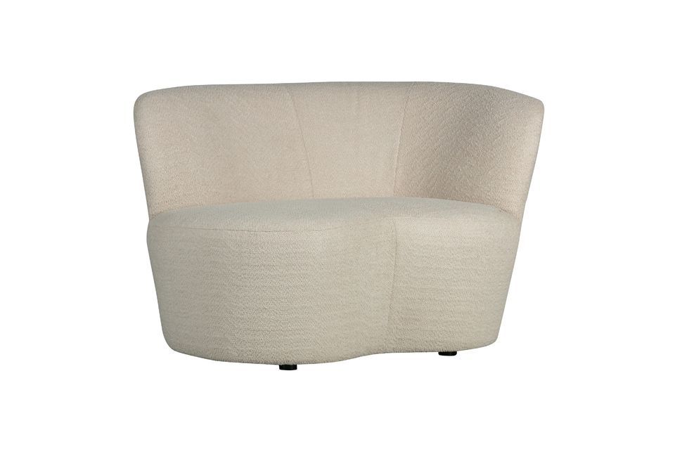 The soft, rounded shapes and the comfortable fabric make this armchair an ideal place to relax