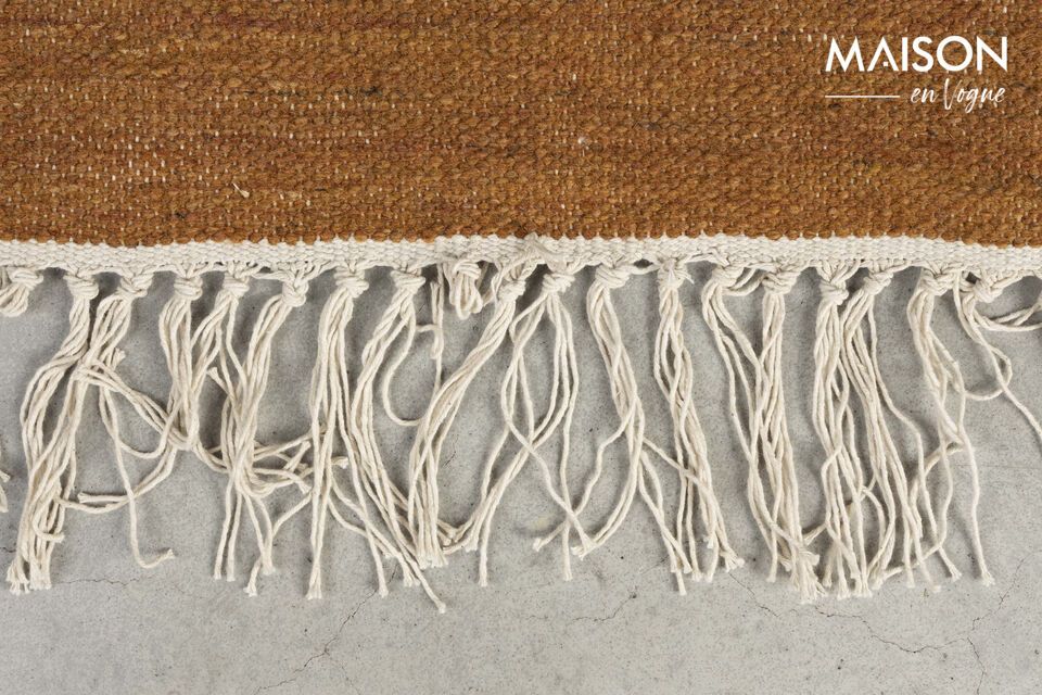 Its wool provides a cozy surface underfoot, transforming any room into a haven of peace