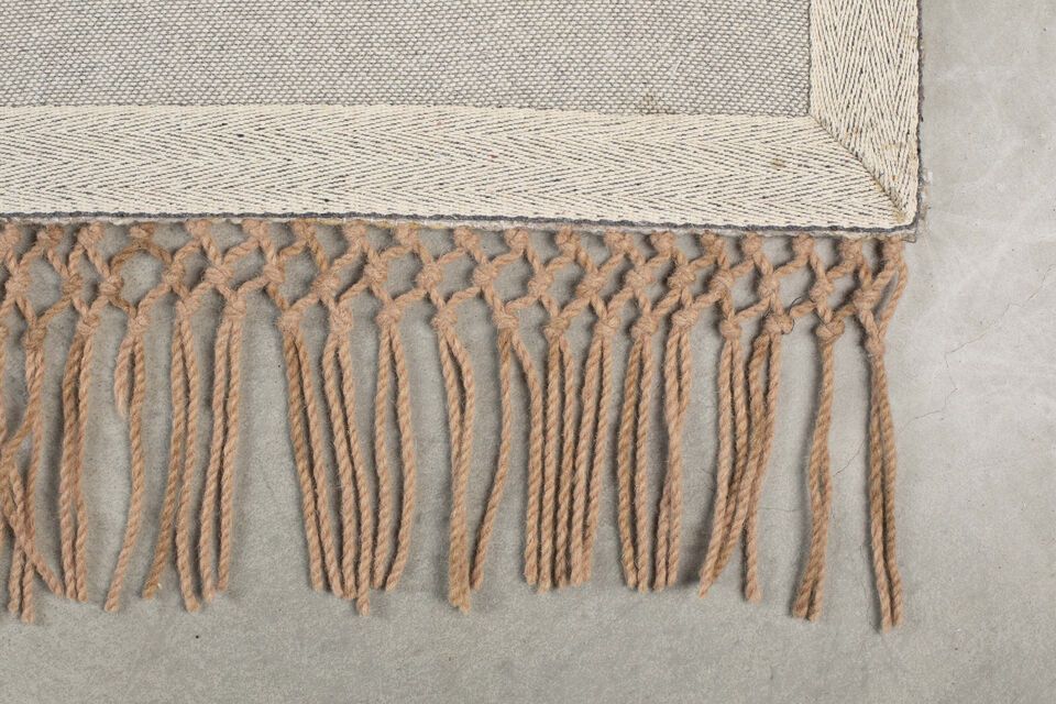 Make your home a warm and welcoming space with this beige wool rug