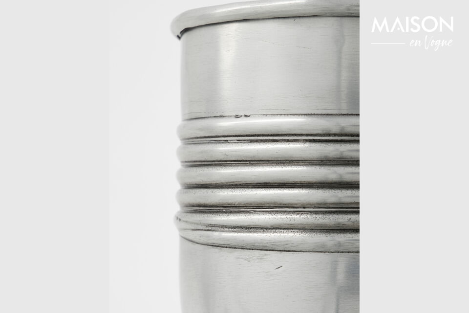 With this set of two handmade planters in antique silver