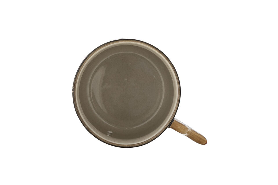 Ogni tazza è dipinta a mano con motivi floreali stilizzati