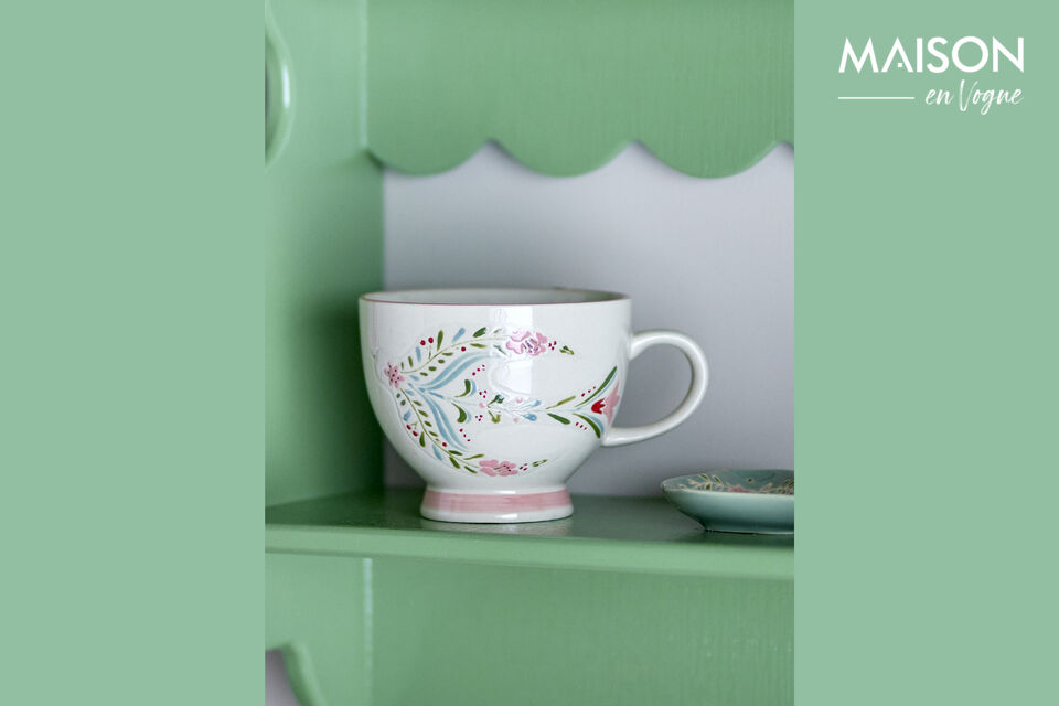Each mug features a handpainted floral motif with a rose-colored rim and foot