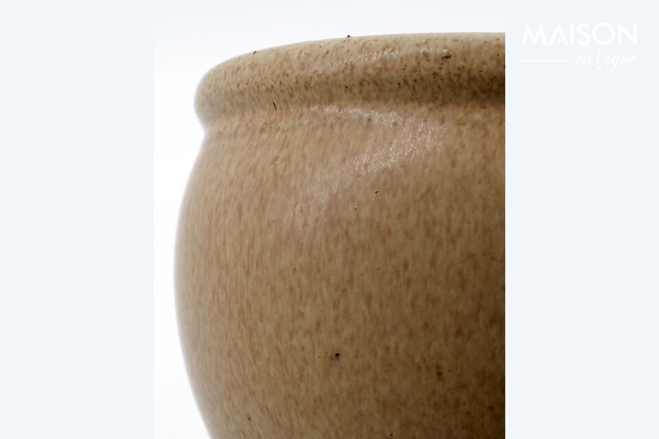 This set of two HDVale planters is crafted from earthenware with a high-gloss beige finish
