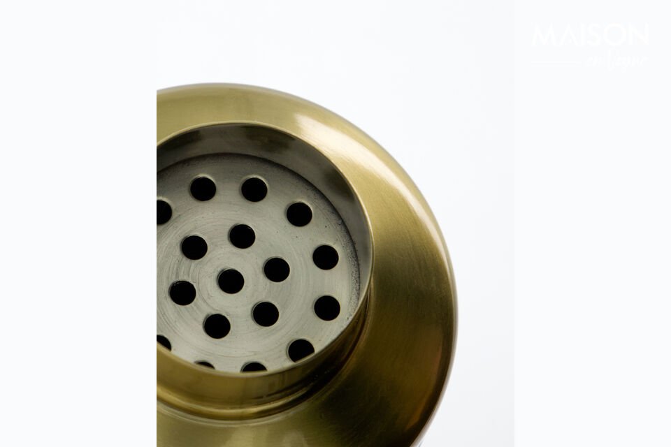 Bring flair and timeless style to your home bar with this shaker in an antique brass finish