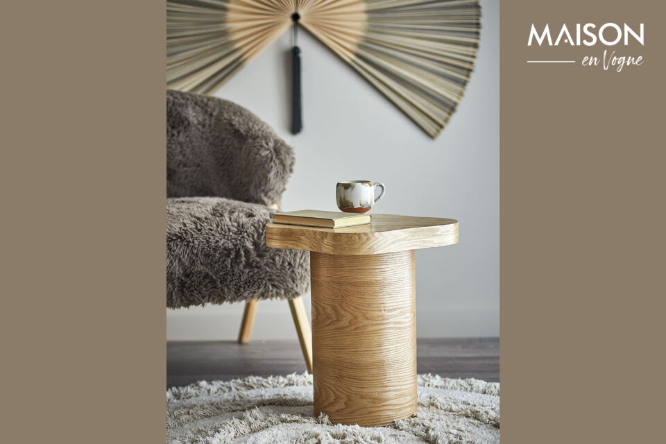 The Elmer Side Table by Bloomingville features a sleek cylindrical base and a top with a matte