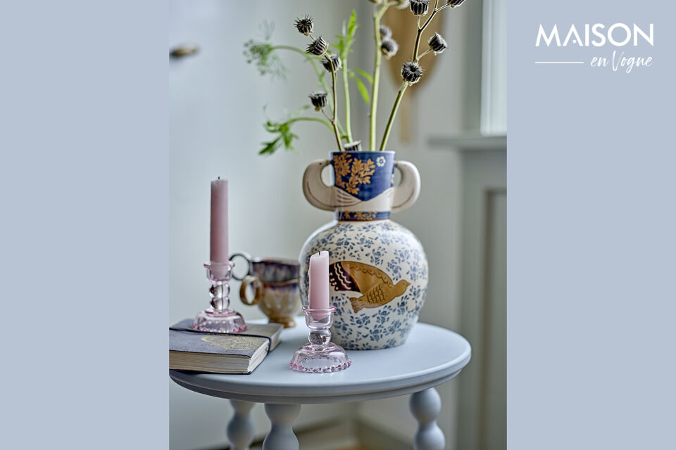 The Salino Side Table by Bloomingville is a charming and delicate table made of rubberwood