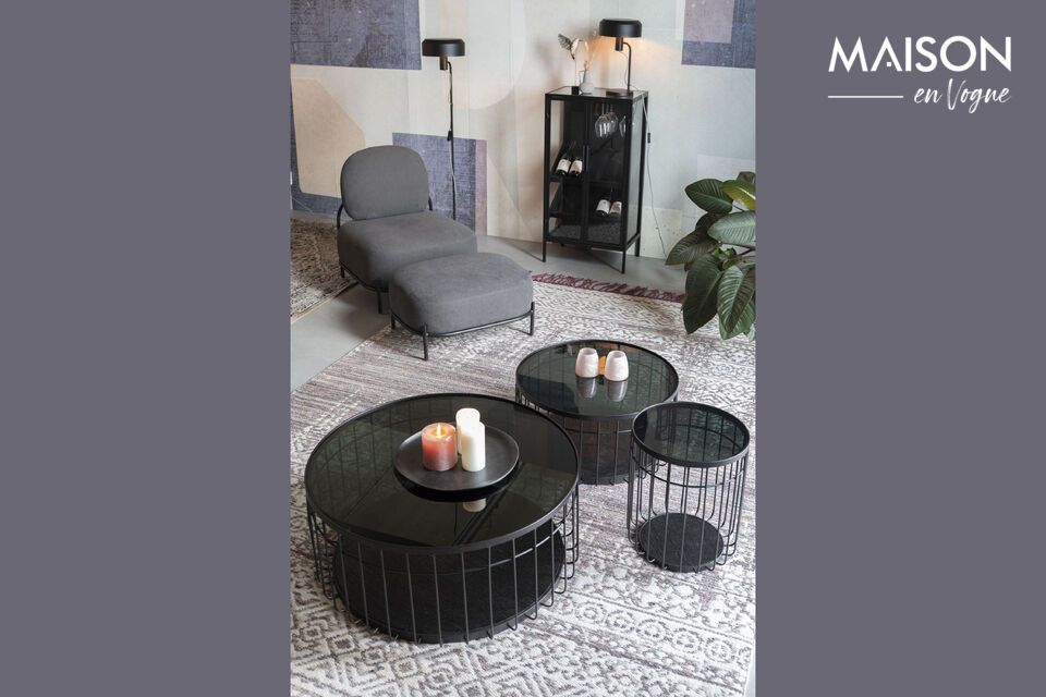 Discover the contemporary charm of our black glass coffee table