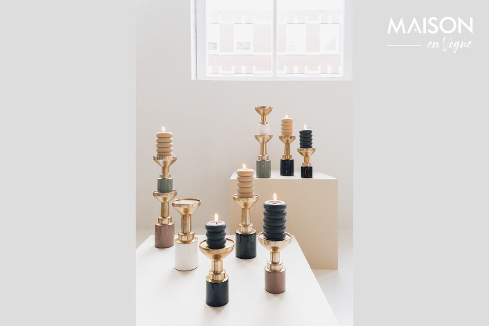Discover the subtle charm of the Small Black Aluminum Candleholder from our Glam series