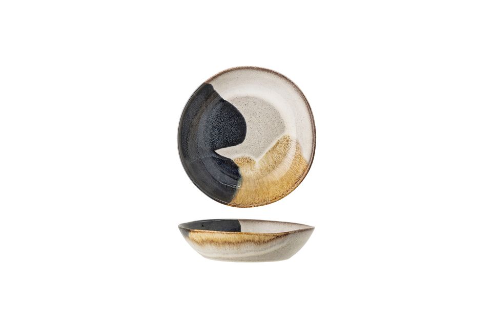 Het handgemaakte steengoedontwerp maakt het tot een uniek stuk met elegante kleurvariaties