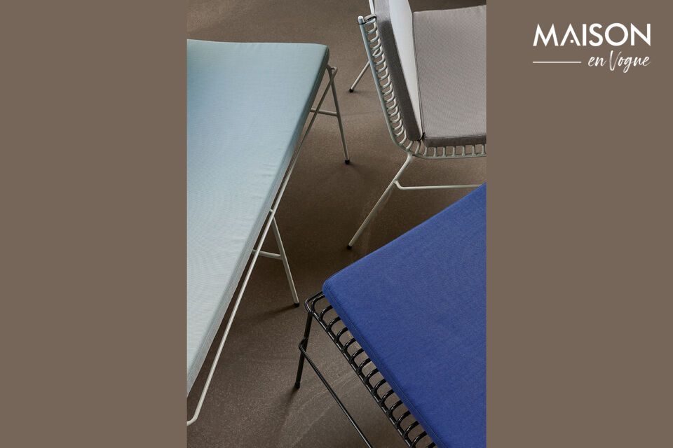 Enhance your comfort with the String cushion in dark blue